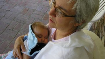 Grandmother holding a grandchild