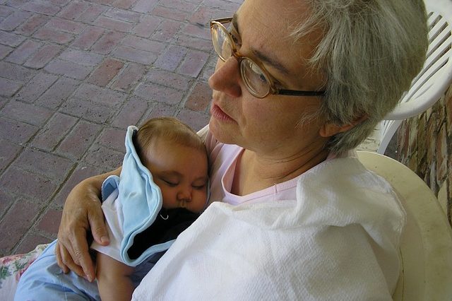 Grandmother holding a grandchild